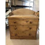 Pine chest of three drawers with upstand