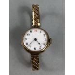 9ct Gold cased white faced watch (A/F)