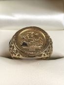 9ct 375 Gold ring set with George and Dragon Gold coloured coin total weight approx 3g size 'O'