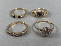 Four 9ct Gold rings set with various designs