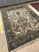 Cream ground rug with floral and bird design approx 220cm x 170cm