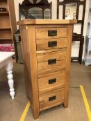 Modern solid light wood tallboy with five drawers approx 56cm x 50cm x 120cm tall