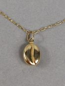 9ct Gold hallmarked 375 fine gold chain approx 44cm long with 9ct Gold coffee bean pendant