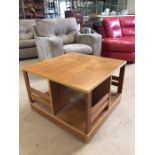 Mid century teak coffee table on castors marked 'made in Denmark' approx 68cm x 68cm x 46cm