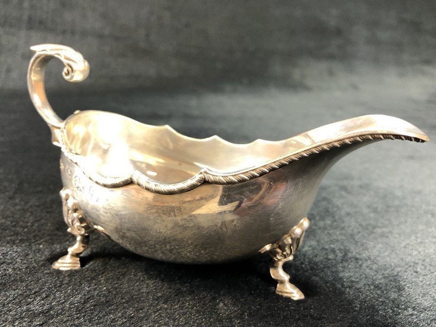 Silver Hallmarked Sauce boat on three feet Marked Birmingham by A Marston & Co height to spout