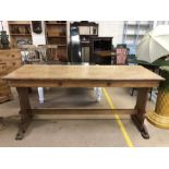 Oak refectory style table with carved lion motif to each end