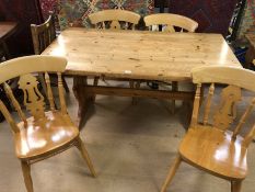 Pine refectory style table approx 150cm x 80cm with four chairs