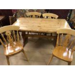 Pine refectory style table approx 150cm x 80cm with four chairs