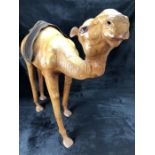 Leather figure of a camel (believed to be originally from Liberty's) approx 62cm high (A/F)