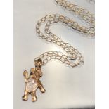 9ct Gold chain with 375 9ct Gold waving teddy bear with inset diamonds (total weight approx 5.4g)