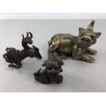 Three Opium weights in the form of Foo dogs/ dogs of Fo, bronze and brass