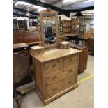 Pine dressing table /chest of drawers with four drawers under and adjustable mirror flanked by two