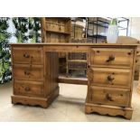 Pine dressing table with six drawers approx 133cm x 47cm x 73cm tall