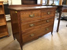 Chest of four drawers with brass handles on original castors and upstand, approx 107cm x 54cm x 83cm