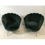 Pair of modern Art-Deco style green velvet scalloped back chairs with brass coloured legs, approx