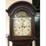 Eight day longcase clock with white face with black roman numerals, image of a harpist, with weights