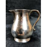 Silver hallmarked handled jug London by maker Edward Barnard & Sons Ltd (total weight 154g)