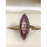 18ct Gold marquis ring set with an outer layer of rose cut diamonds, five old mine cut Diamonds to