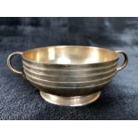 A Twin handled Silver London Hallmarked bowl by maker Edward Barnard & Sons Ltd engraved "Carolyn