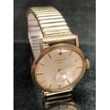 Gents LONGINES gold watch with gold batons, case marked 9ct 375, in working condition, inscribed