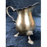 Silver Hallmarked milk jug on three splayed feet London by maker Payne & Son (approx 112g