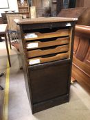 Vintage oak Abbess tambour front cabinet with nine sliding drawers, approx 48cm x 40cm x 94cm tall