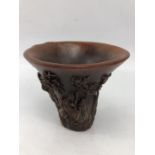 Chinese libation cup with carved design, approx 12cm tall