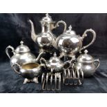 Selection of silver plated ware to include tea and coffee pots, milk jug, sugar bowl, toast racks