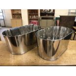 Pair of large Champagne buckets with engraved details to sides. One side engraved with a quote