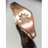 9ct Gold ring set with a single Diamond in a star mount hallmarked 375 size I