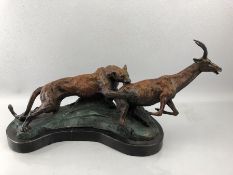 Cast bronze model of a panther and a stag on plinth, approx length 59cm