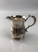 Silver Birmingham hallmarked jug with all over repousse decoration approx 94g and 8cm tall