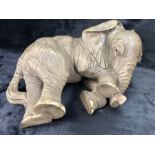 Figure of a recumbent elephant, approx length 60cm