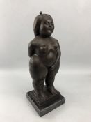 Figurine of a rotund lady with eyes closed, marked SIKA, approx 37cm tall