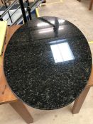 Black polished oval granite table top approx 120cm x 75cm x 2cm