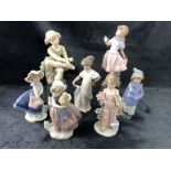Collection of three Lladro and three Nao figurines, along with a figurine of a ballerina by D'