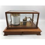 Vintage seven day Glass cased Barograph with brass fittings and a draw beneath with original