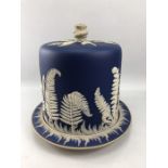 19th Century Jasperware cheese dome and stand with fine frieze of ferns on a blue background, approx
