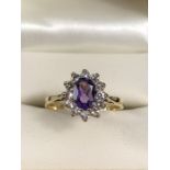 Maker Steele and Dolphin 18ct Amethyst and diamond cluster ring. The Amethyst measures approx: 7.