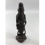 Bronze figure approx 14cm tall of standing figure possible of Eastern origins