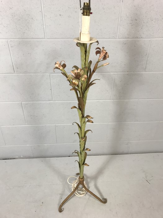 Vintage lamp stand of metal leaves and flowers, approx. 35cm at base and 130cm tall.