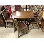 Extending refectory-style table with four chairs with padded seats