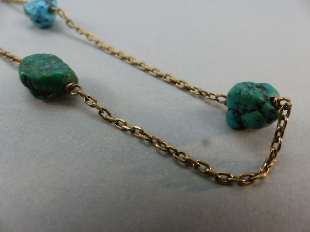 9ct Gold Turquoise Necklace approx: 25” long. The facetted trace link chain is set with 9 natural - Image 2 of 4