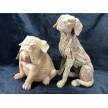 Two carved decorative dogs, the larger approx 40cm tall, the smaller approx 27cm