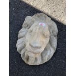 Ornamental stone plaque of a lions face