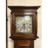 Attractive four day longcase clock with silver dial and black roman numerals, mahogany case, weights