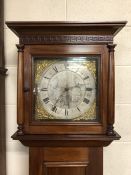 Attractive four day longcase clock with silver dial and black roman numerals, mahogany case, weights