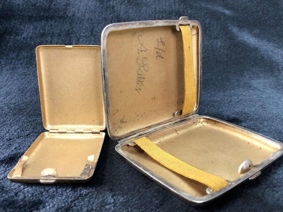 Two Silver coloured cigarette boxes one with enamel badge which reads "British Empire Exhibition - Image 2 of 3