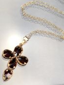 9ct Gold fine link chain with cross pendant of five pear shaped faceted stones.