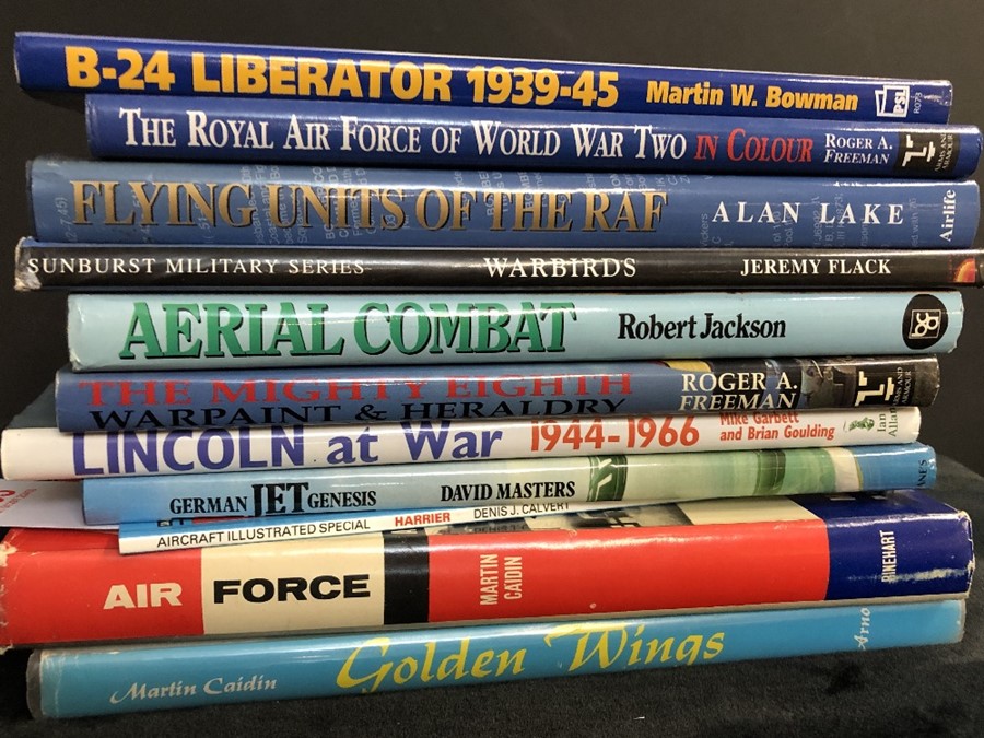 AVIATION AND AERONAUTICAL BOOKS AND MAGAZINES: A COLLECTION OF 11 VOLUMES RELATING TO MILITARY